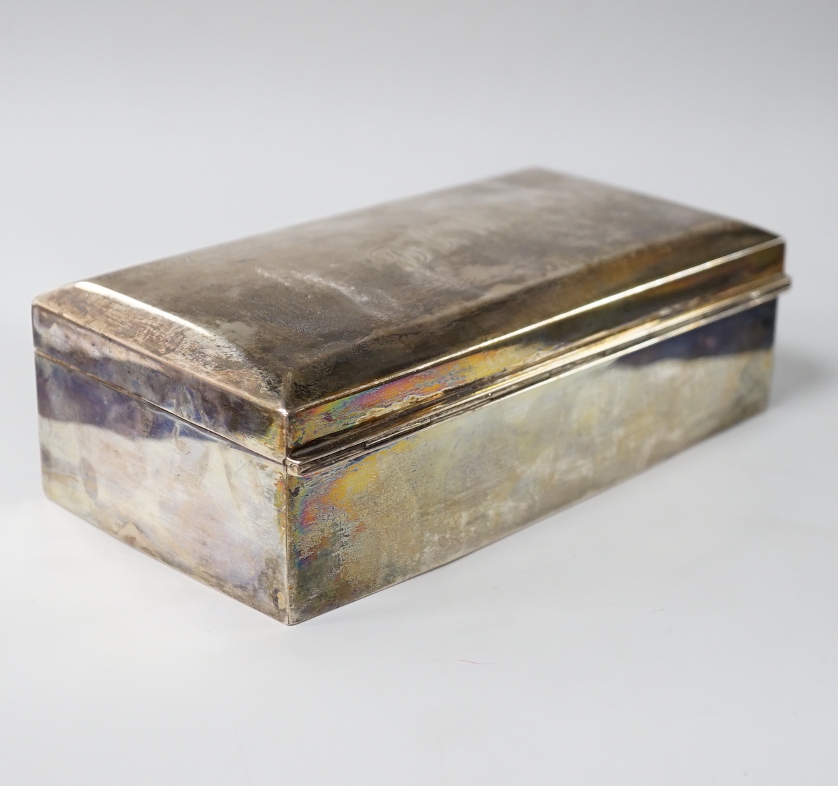 A George V plain rectangular silver cigarette box, Birmingham 1921, 18cm, gross 538 grams